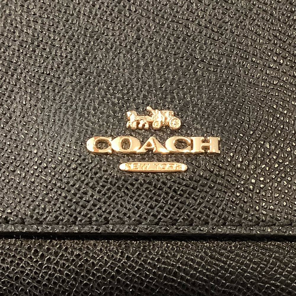 
                      
                        Coach Trifold Wallet
                      
                    