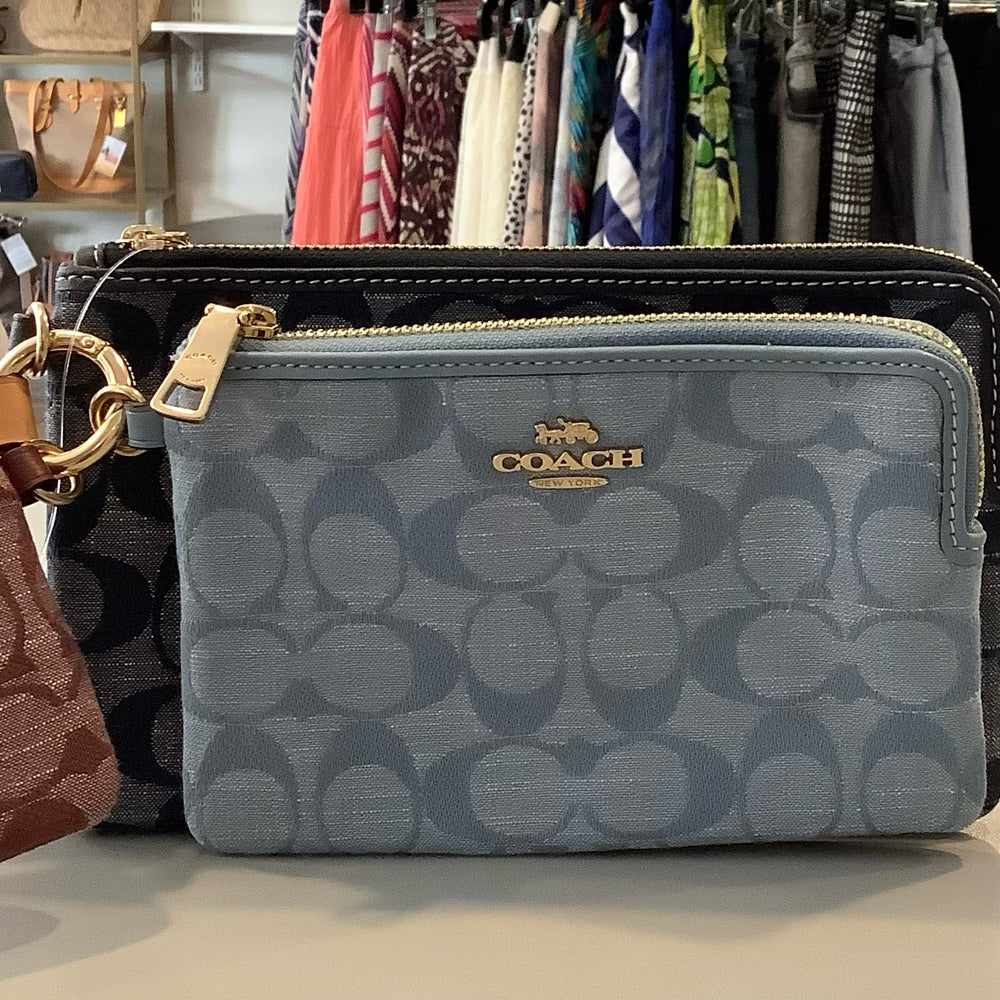 
                      
                        Coach Corner Zip Trio Wristlet
                      
                    