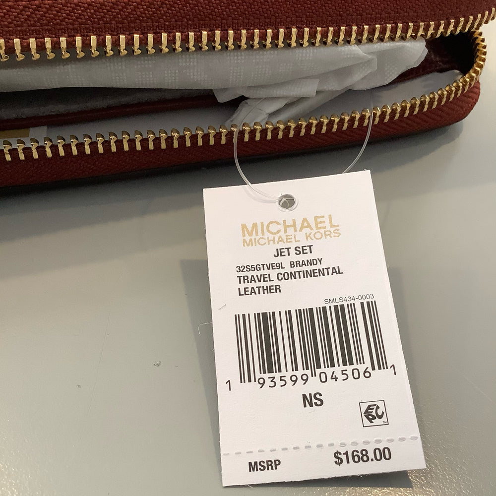 
                      
                        Michael Kors Wallet
                      
                    