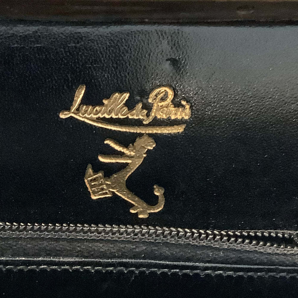 
                      
                        Lucille de Paris Handbag
                      
                    