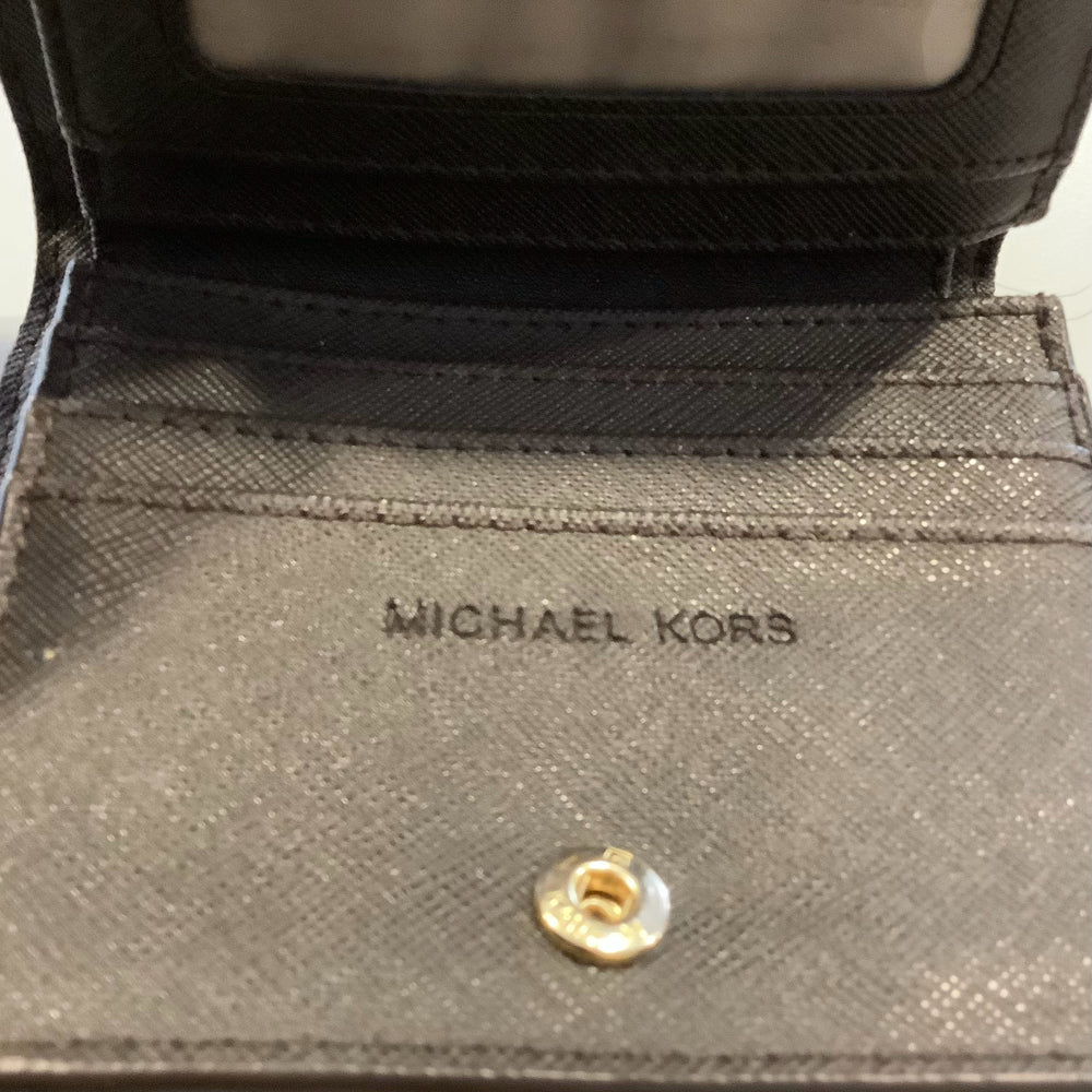 
                      
                        Michael Kors Mongram Wallet
                      
                    