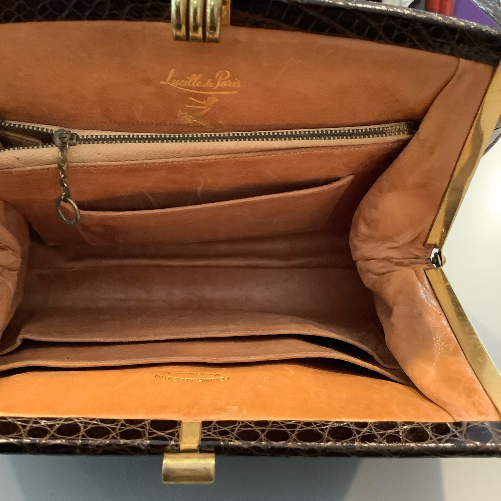 
                      
                        Lucille de Paris Handbag
                      
                    