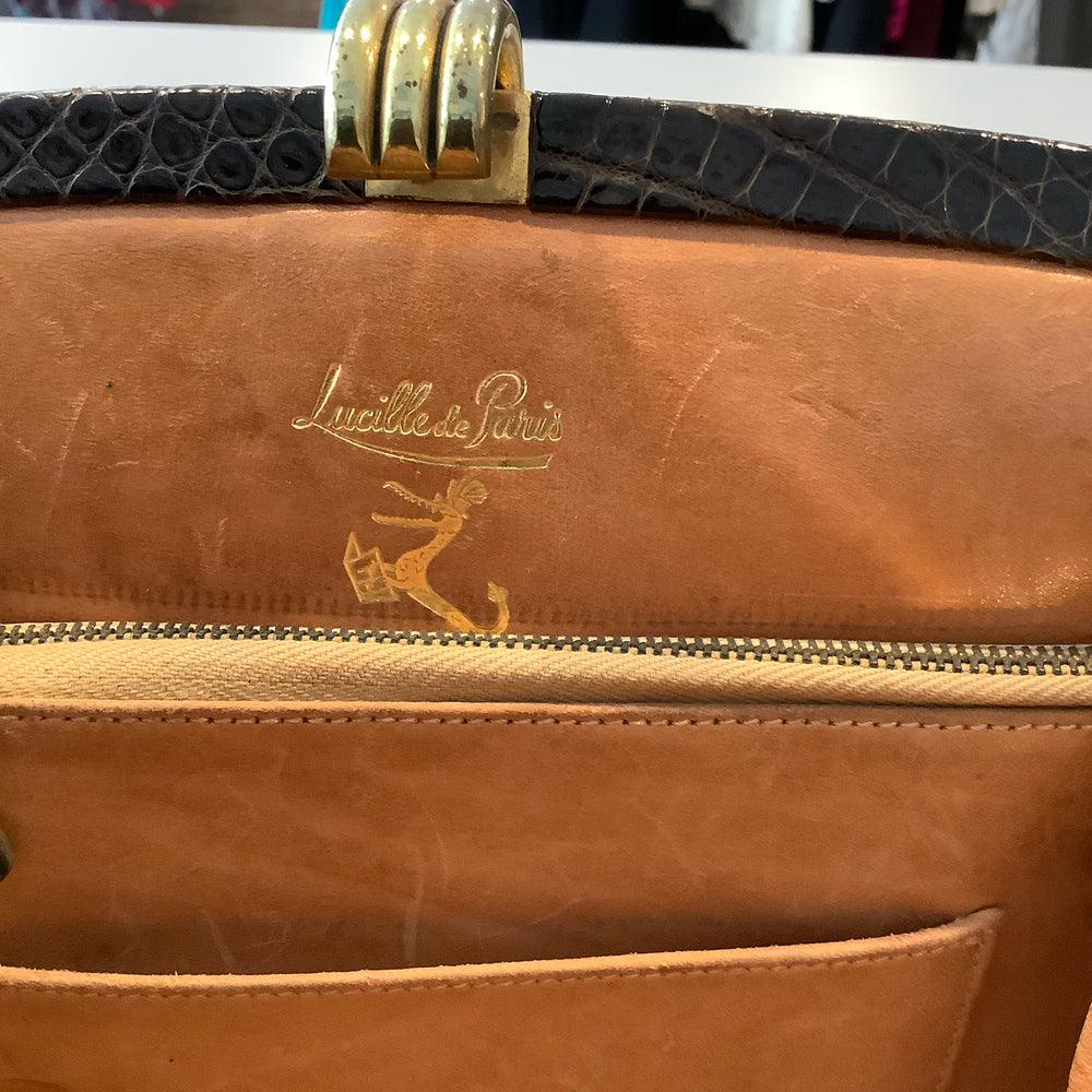 
                      
                        Lucille de Paris Handbag
                      
                    